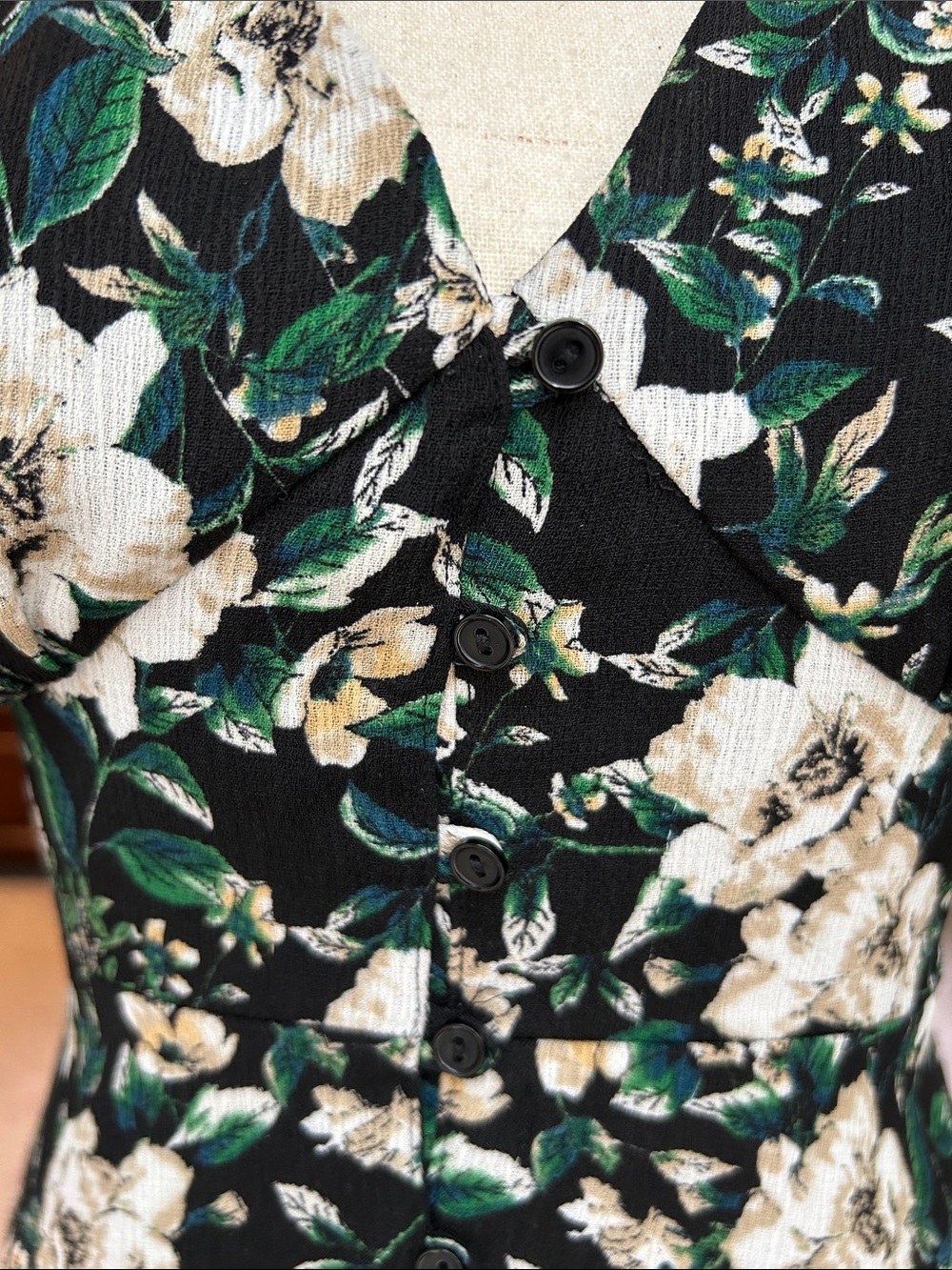 Astr Black Floral V-Neck Midi Dress with White Flowers and Green Leaves - Picture 3 of 8